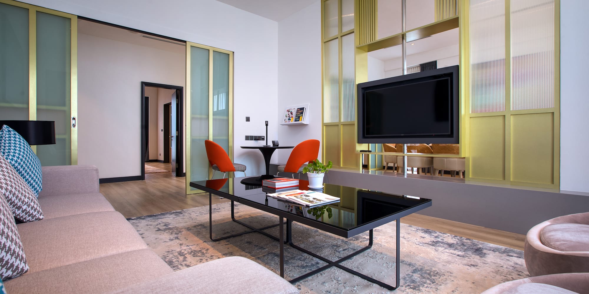 a living room with a tv and a couch