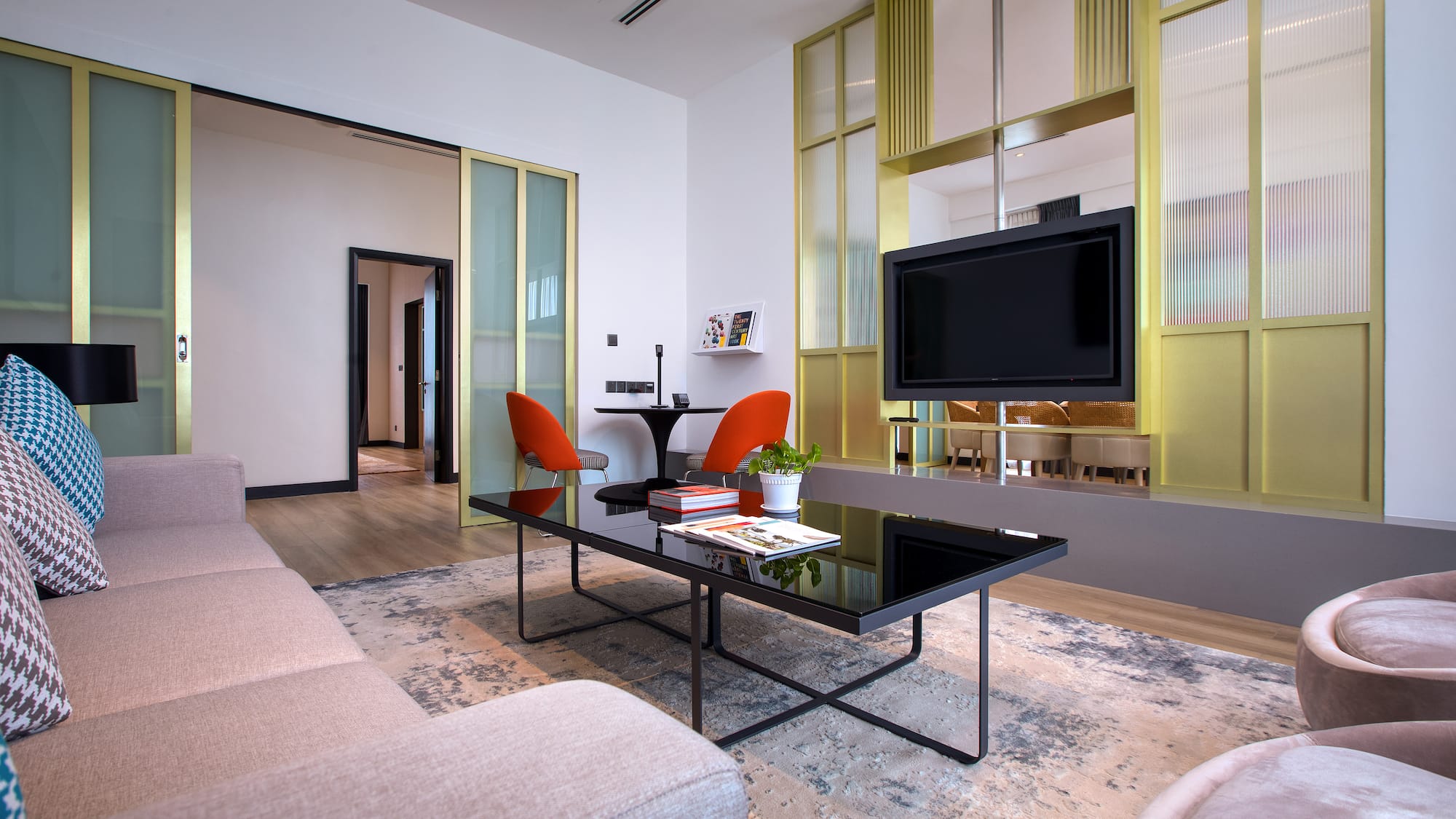 a living room with a tv and a couch