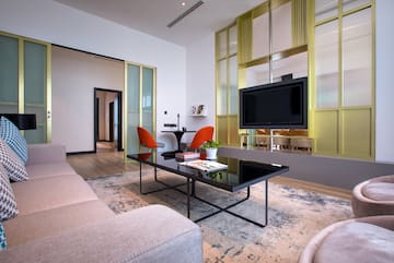 a living room with a tv and a couch