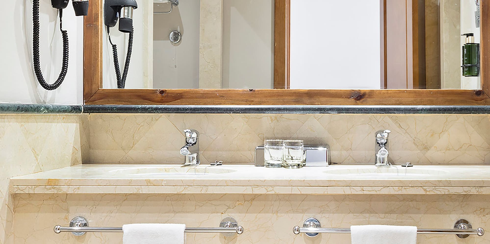 a bathroom with a mirror and a sink