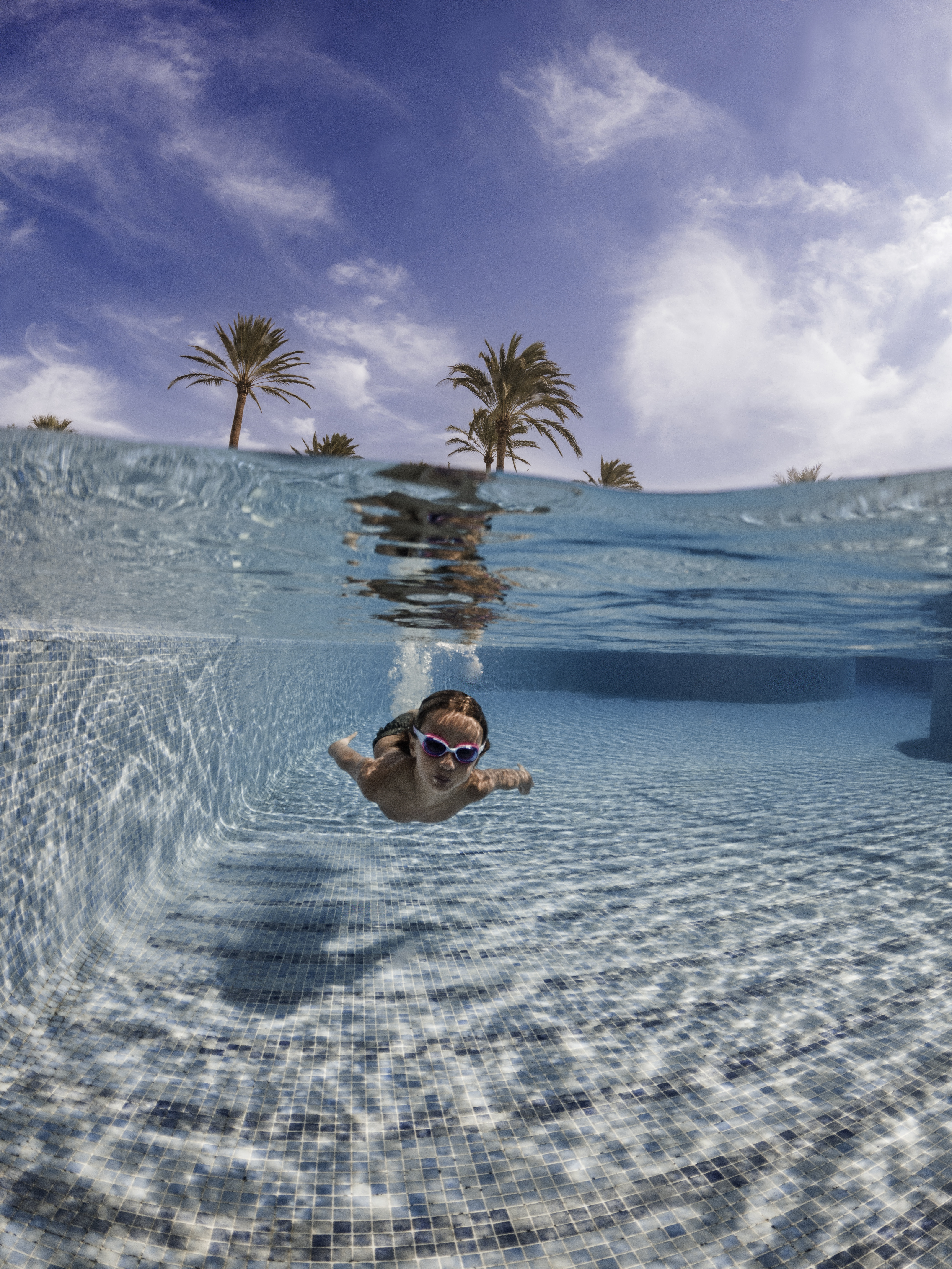 a person swimming in a pool