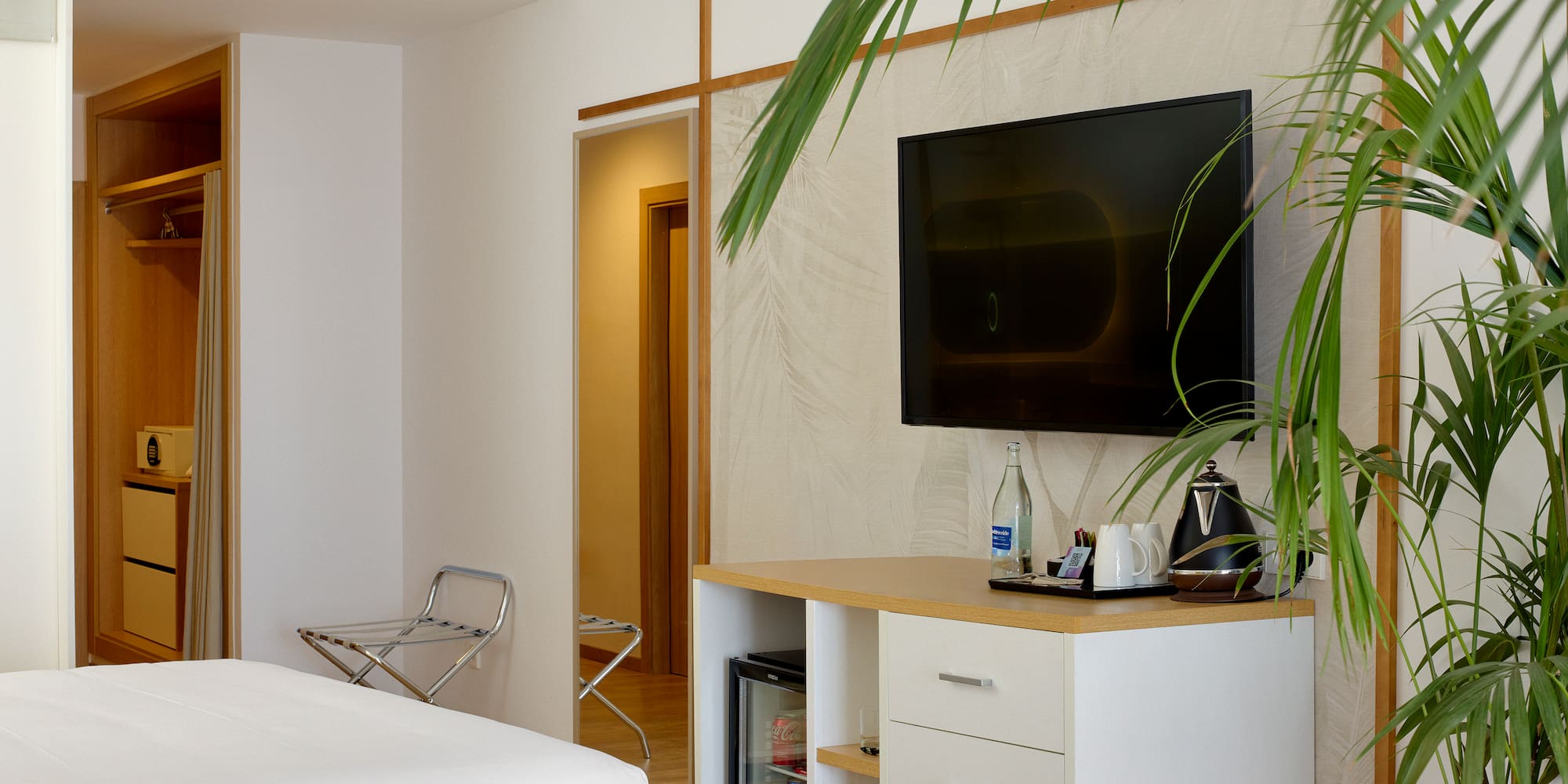 a room with a tv on the wall