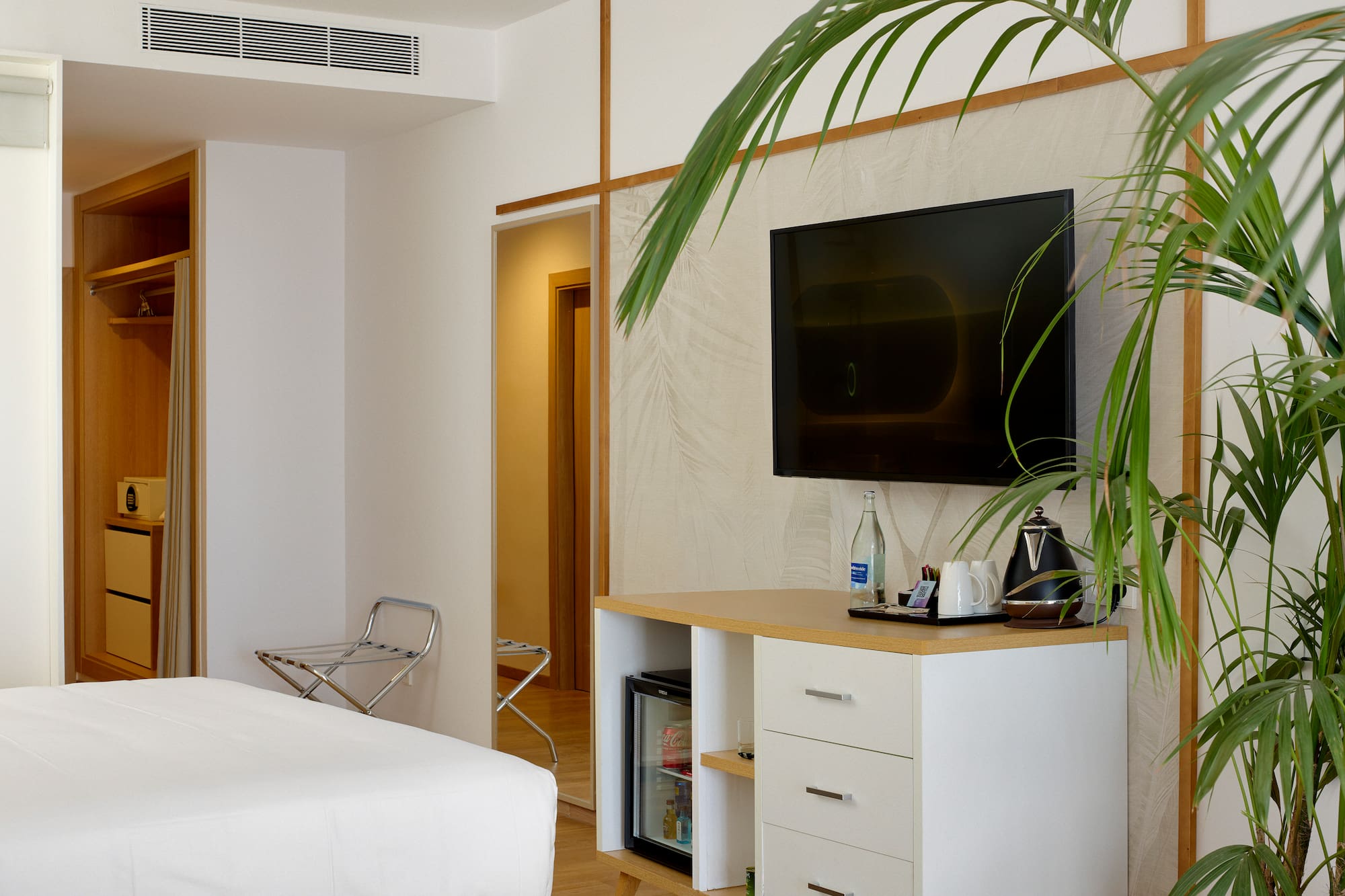 a room with a tv on the wall