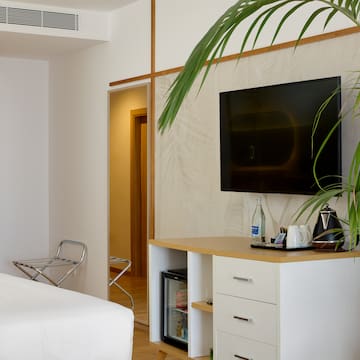 a room with a tv on the wall