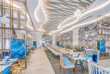 a restaurant with tables and chairs