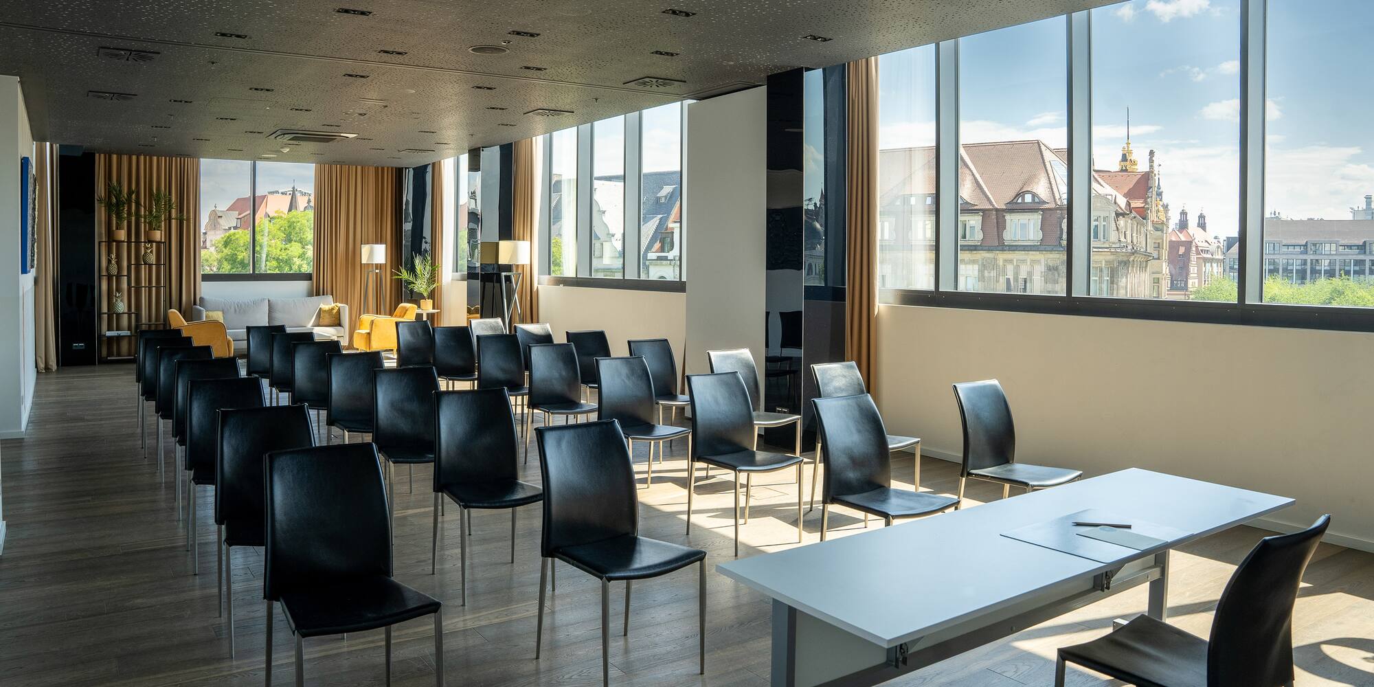 a room with many chairs and tables