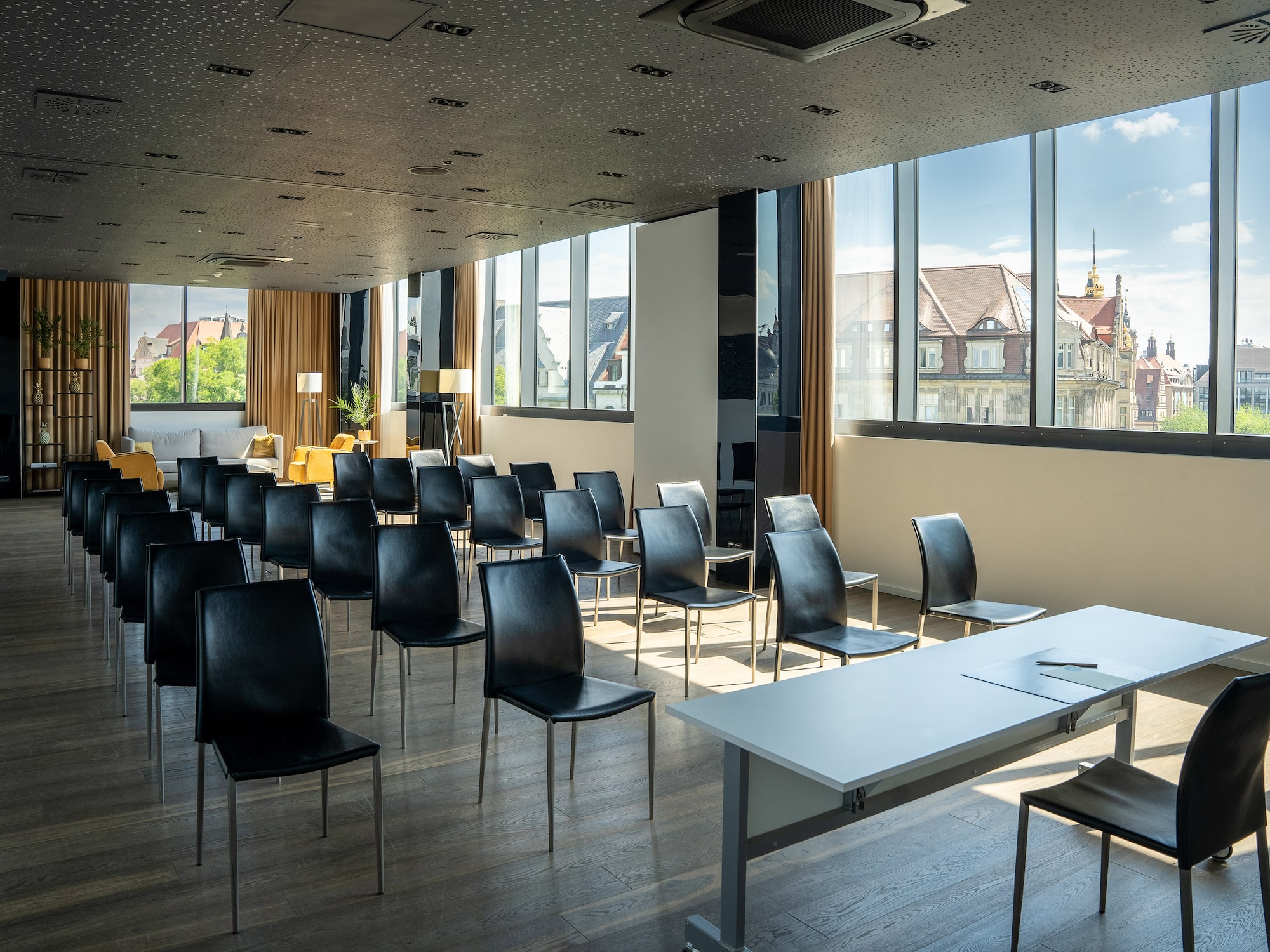 a room with many chairs and tables