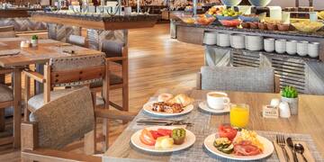 a restaurant with food on plates