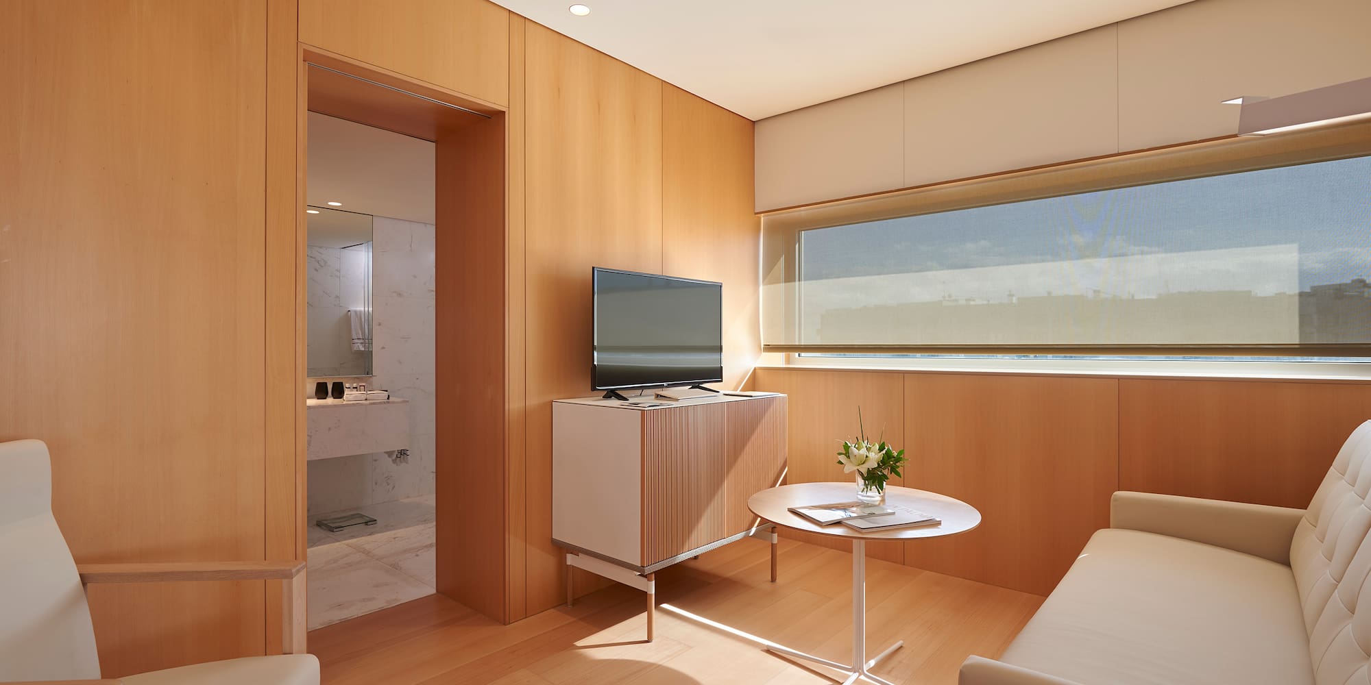 a room with a television and a table