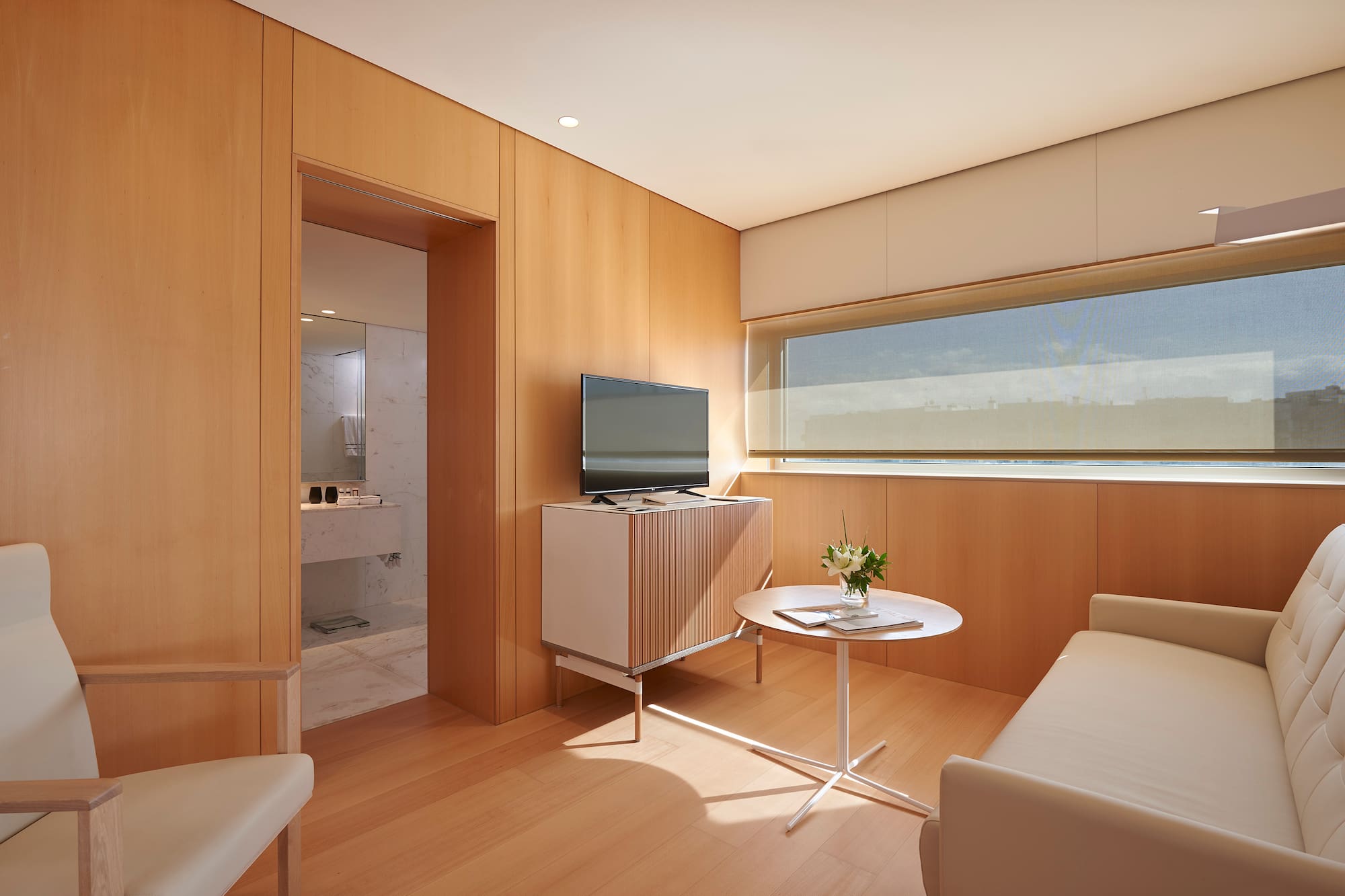 a room with a television and a table