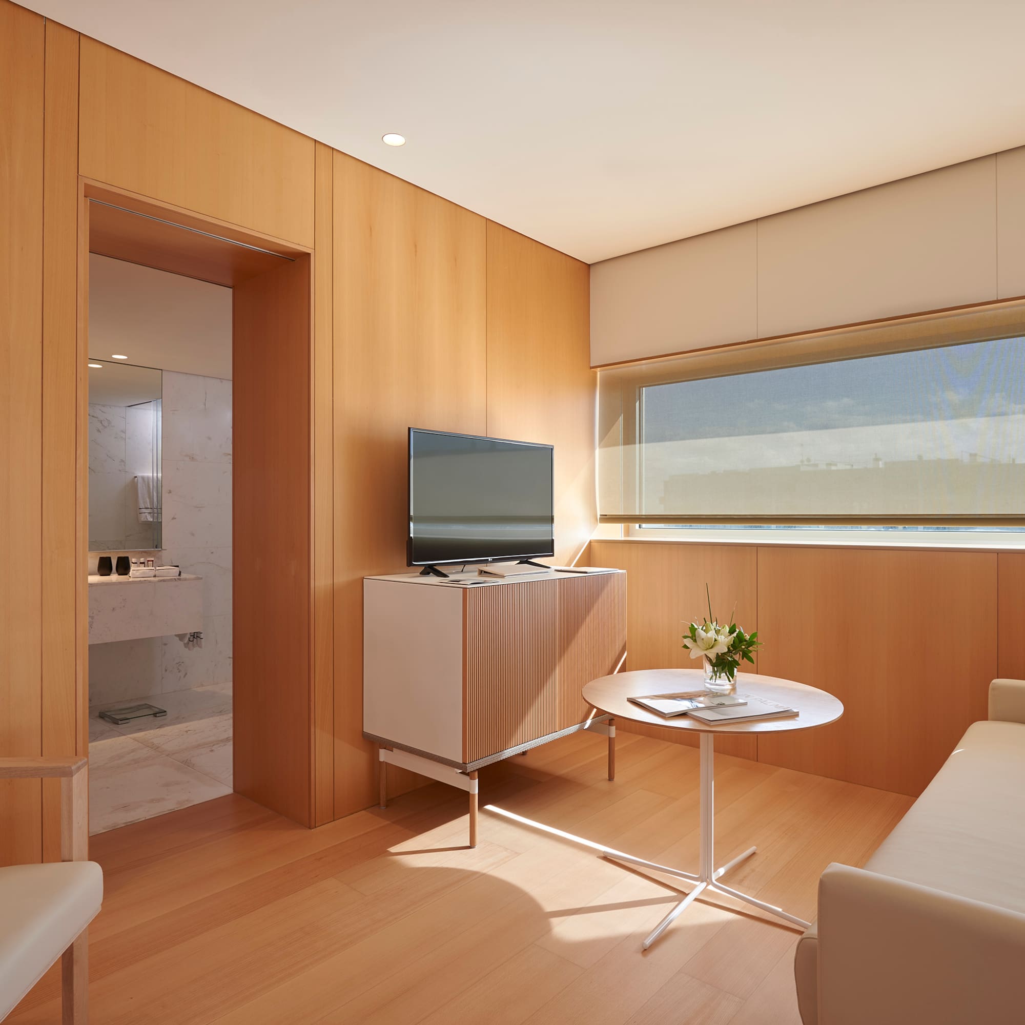 a room with a television and a table