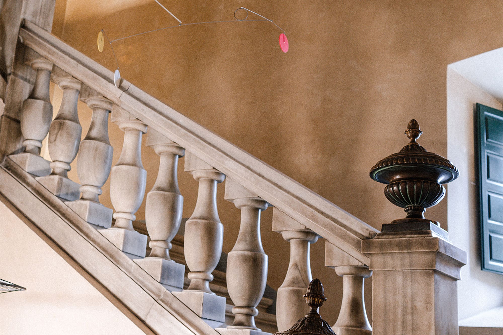 a staircase with a white railing