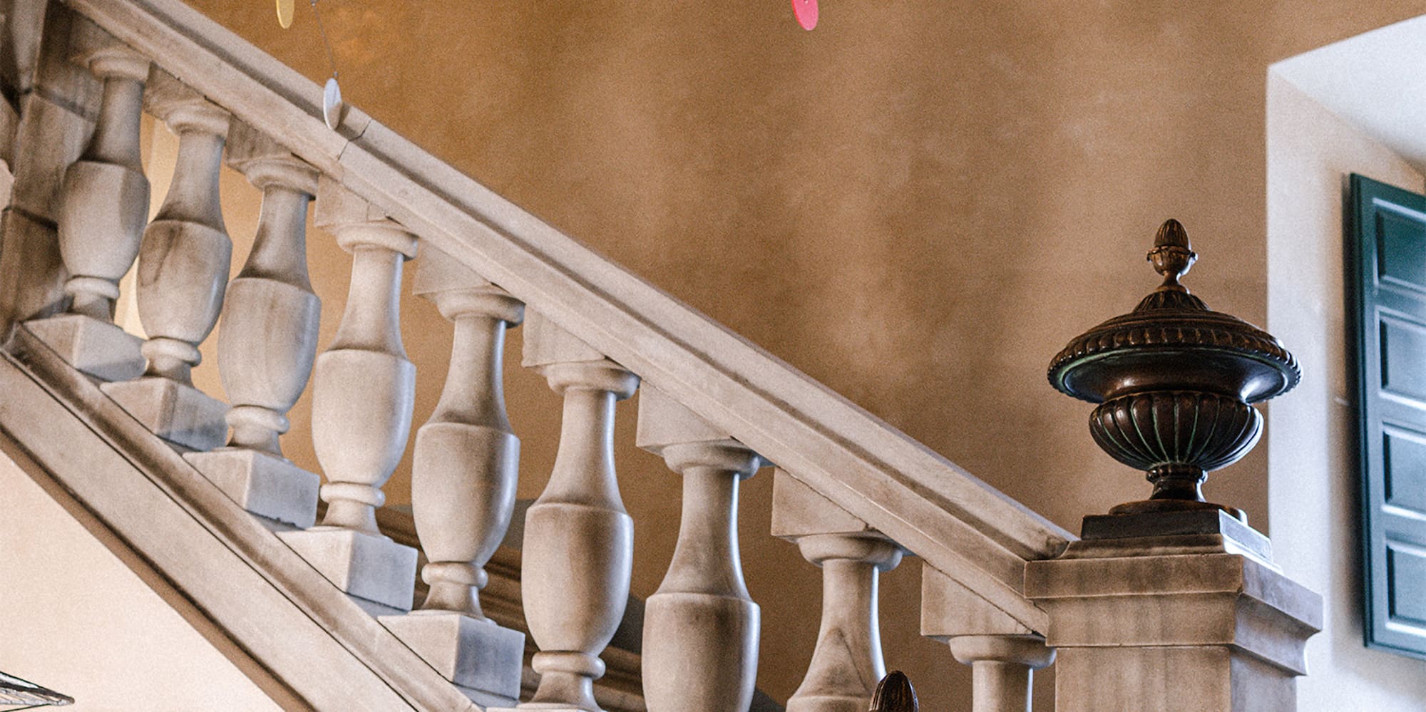 a staircase with a white railing