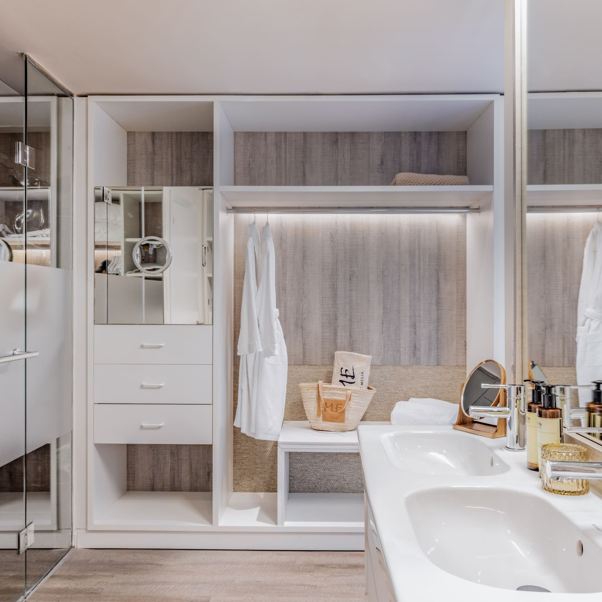 a bathroom with a shower and a sink