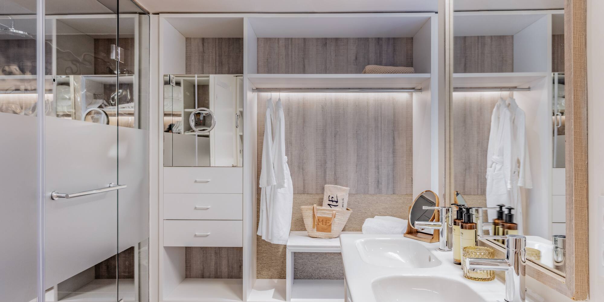 a bathroom with a shower and a sink