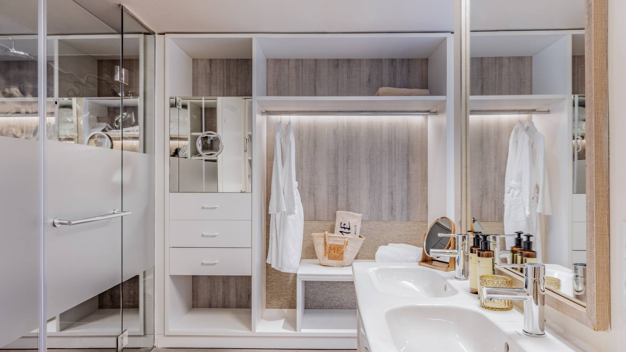 a bathroom with a shower and a sink