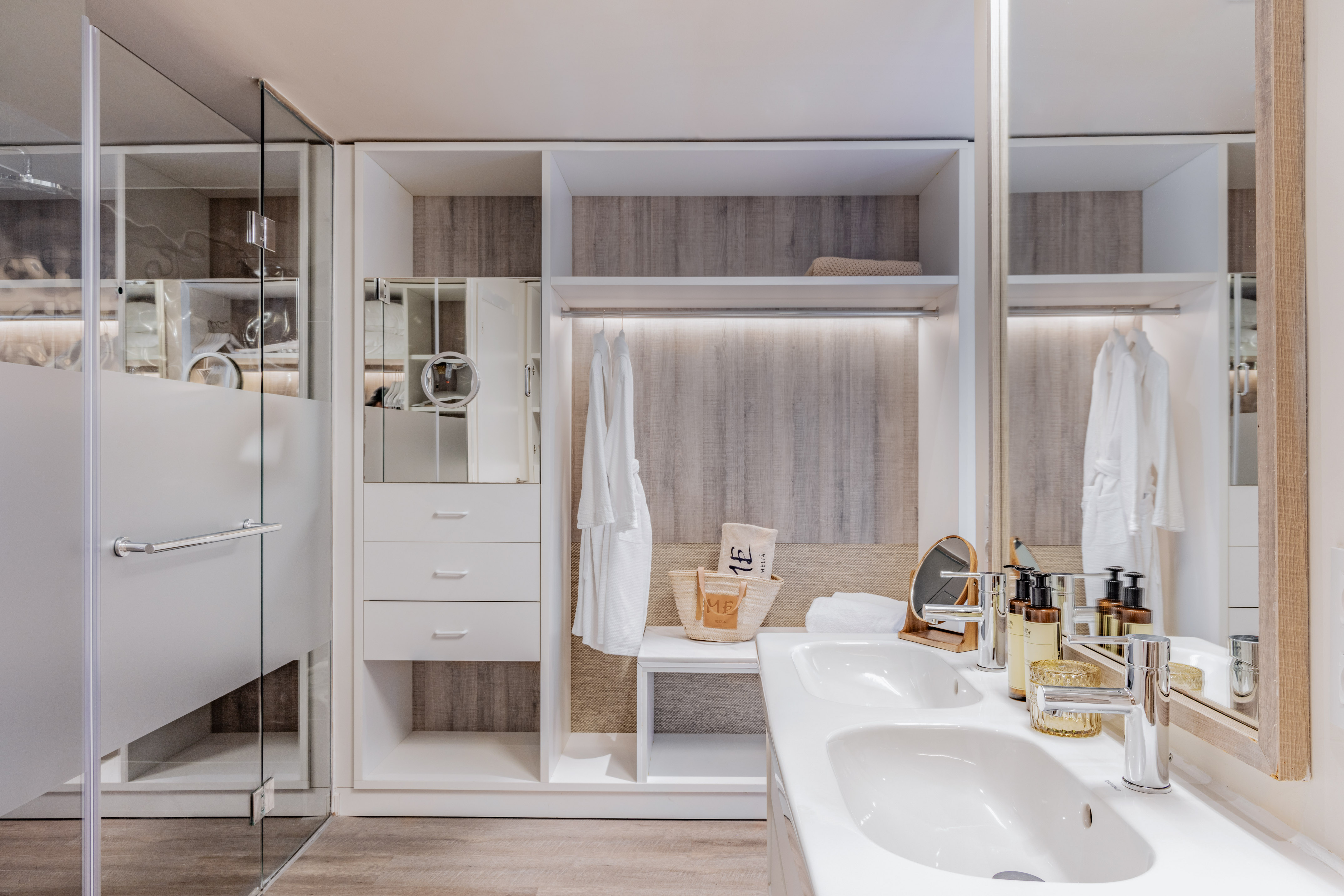 a bathroom with a shower and a sink
