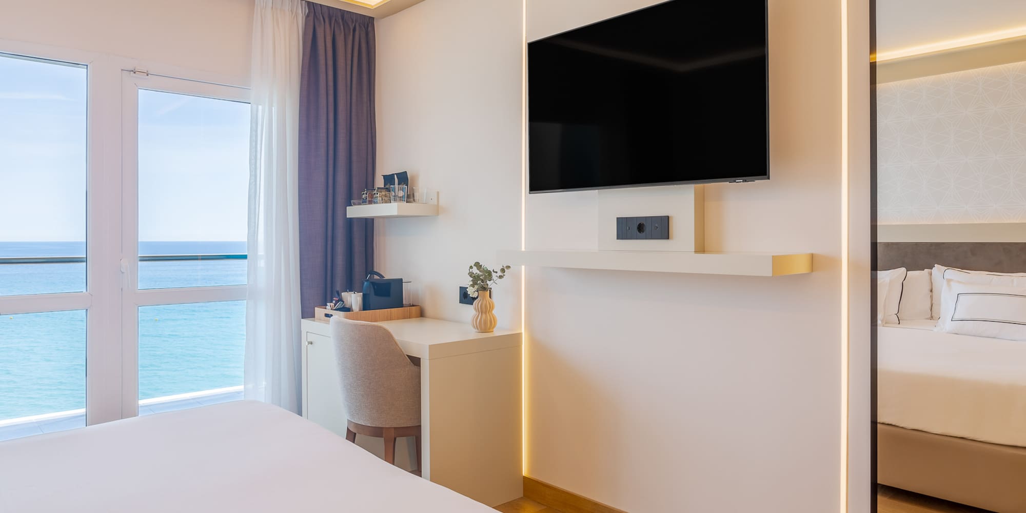a room with a tv on the wall