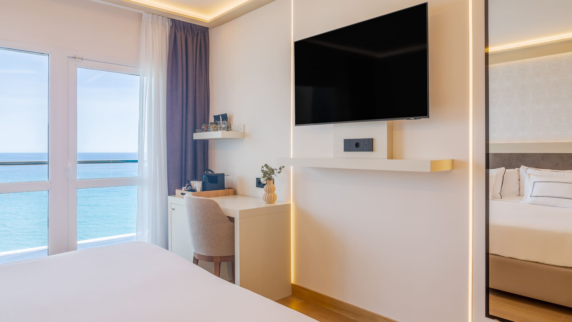 a room with a tv on the wall