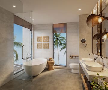 a bathroom with a tub and sink