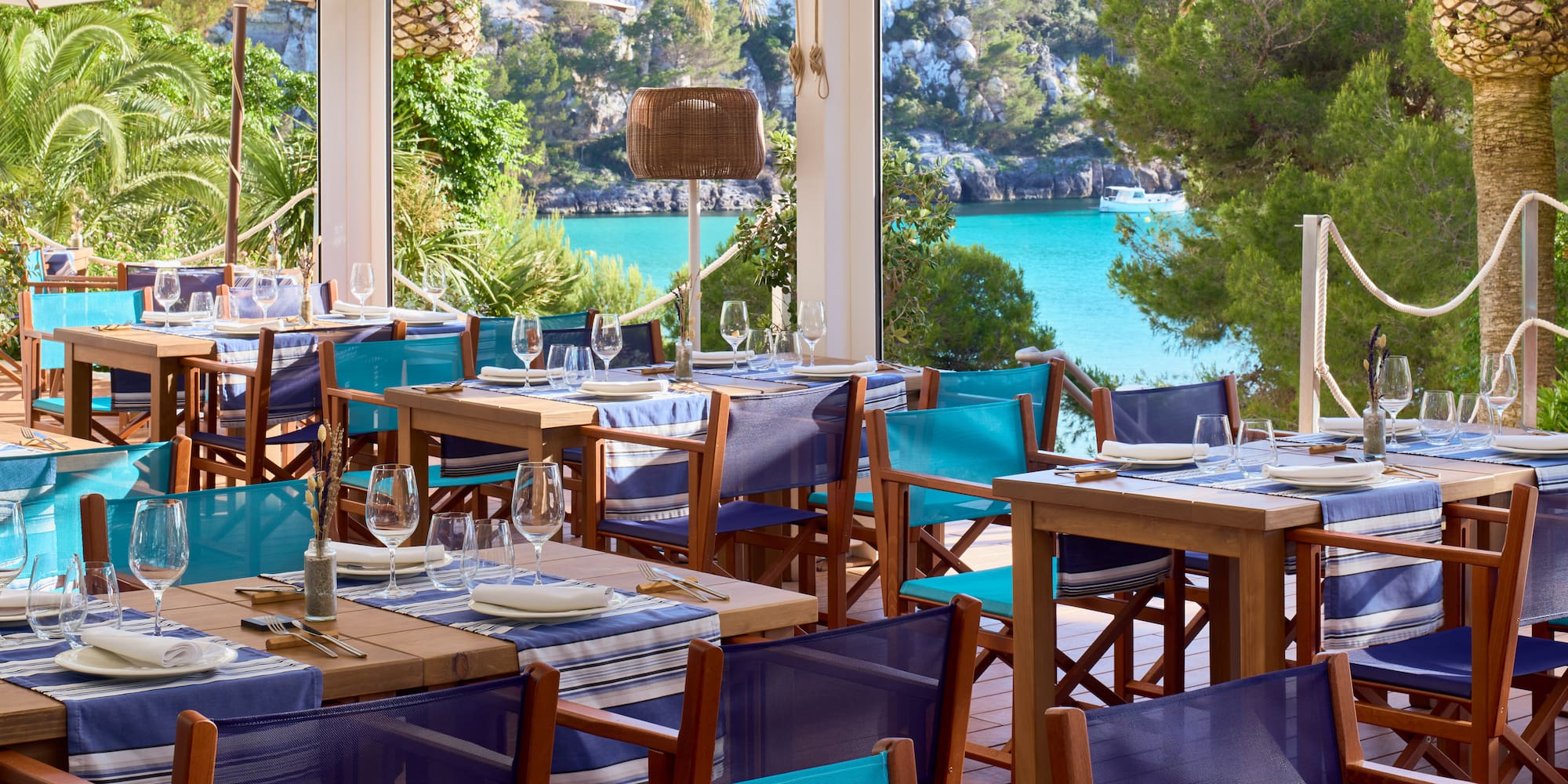 a restaurant with tables and chairs