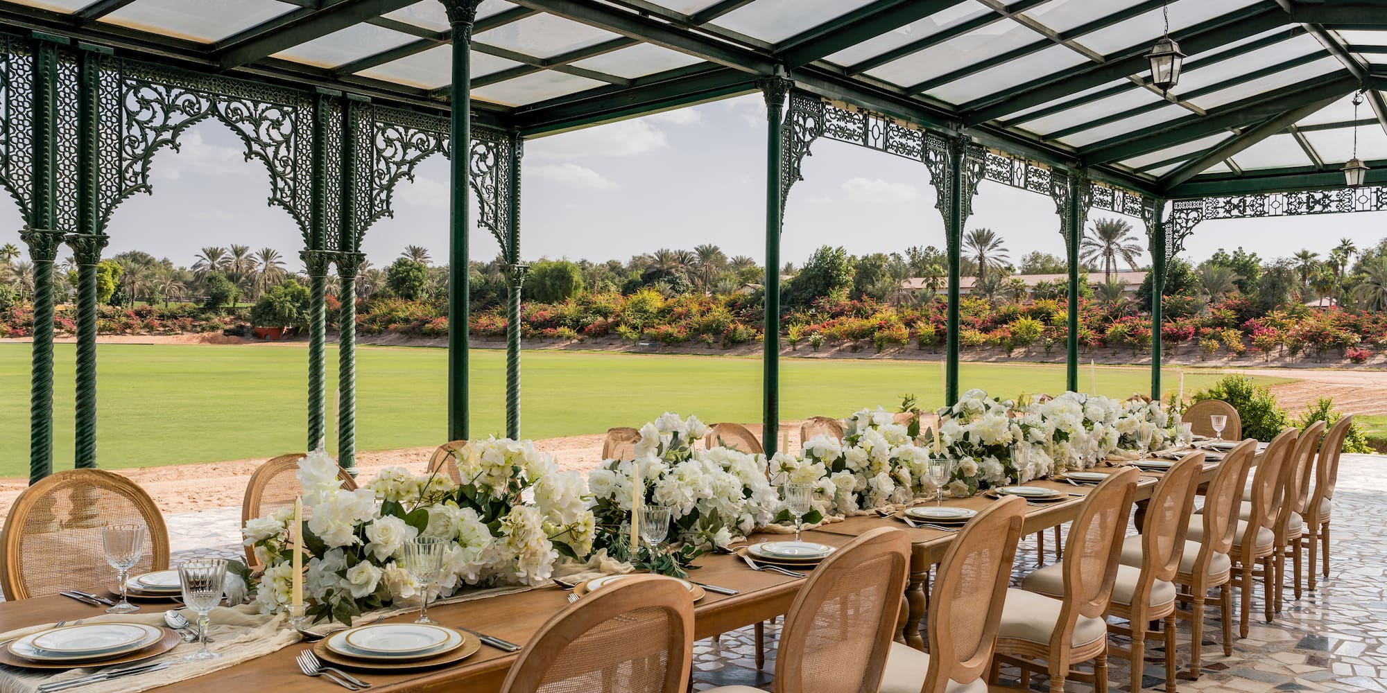 a long table set for a dinner party