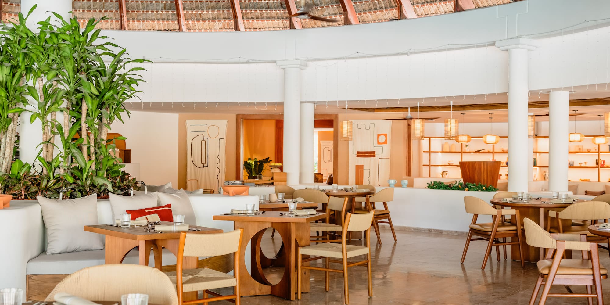 a restaurant with tables and chairs