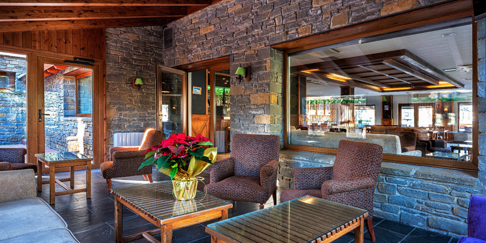 a patio with chairs and a table