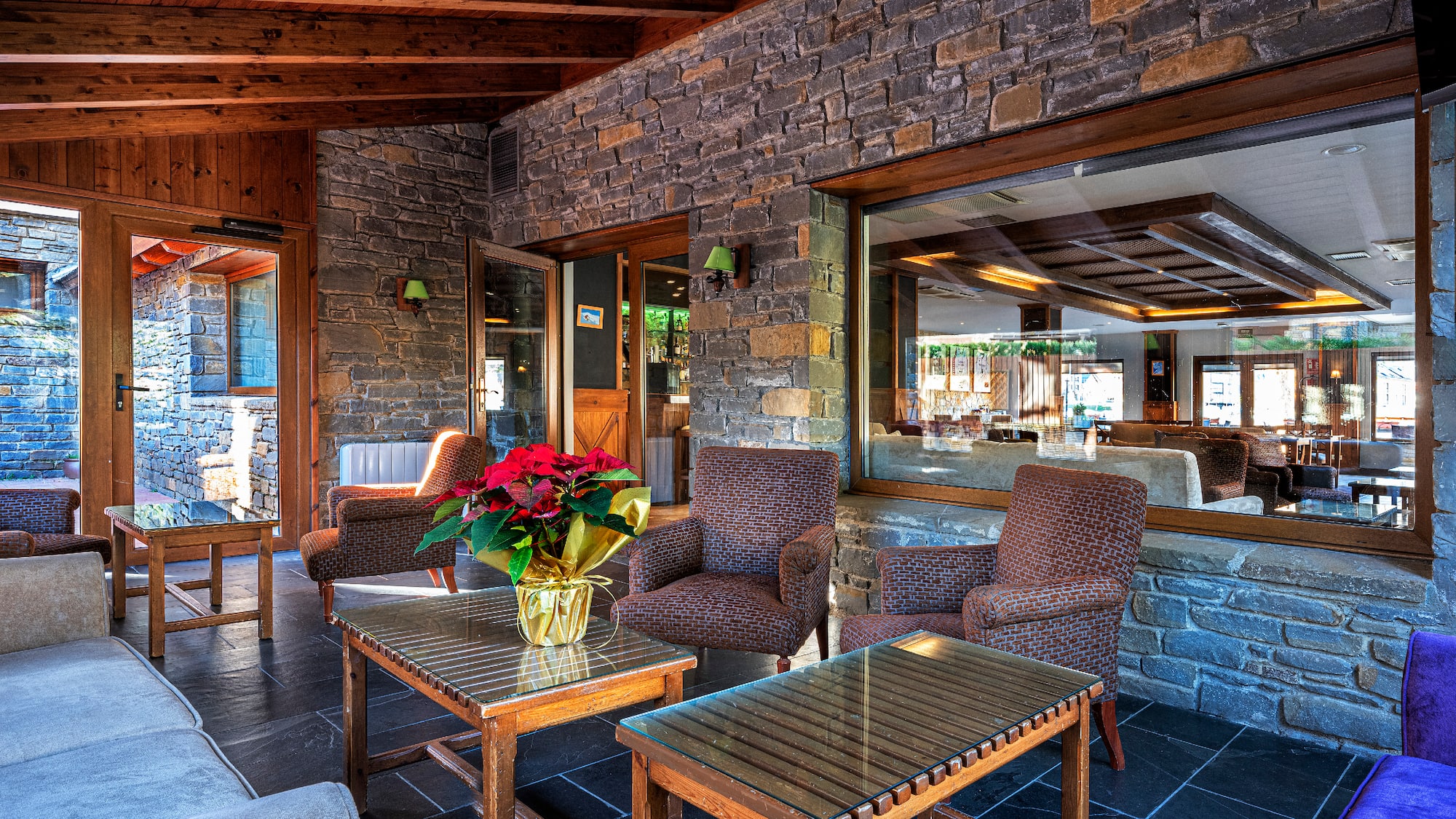 a patio with chairs and a table