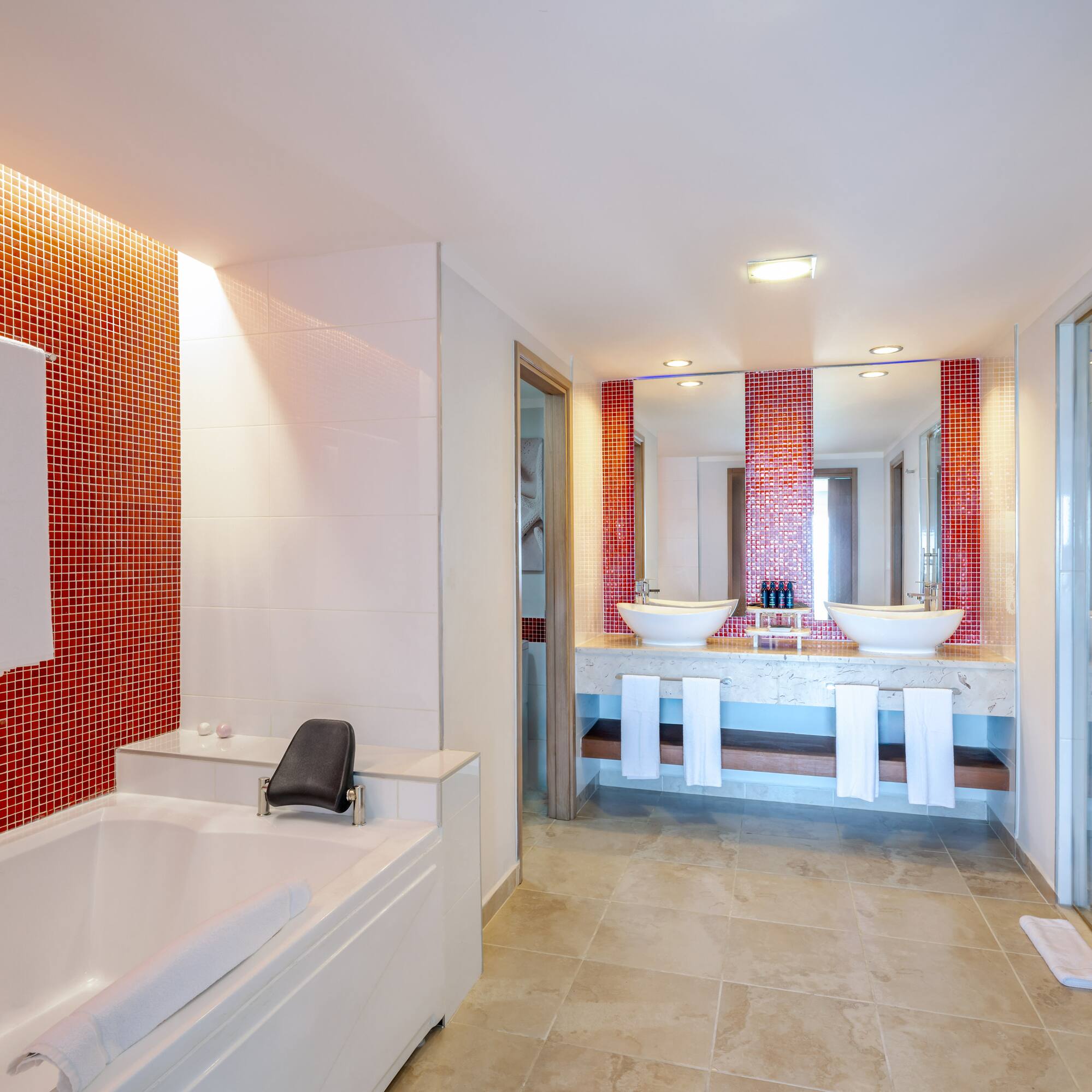 a bathroom with a bathtub and sink