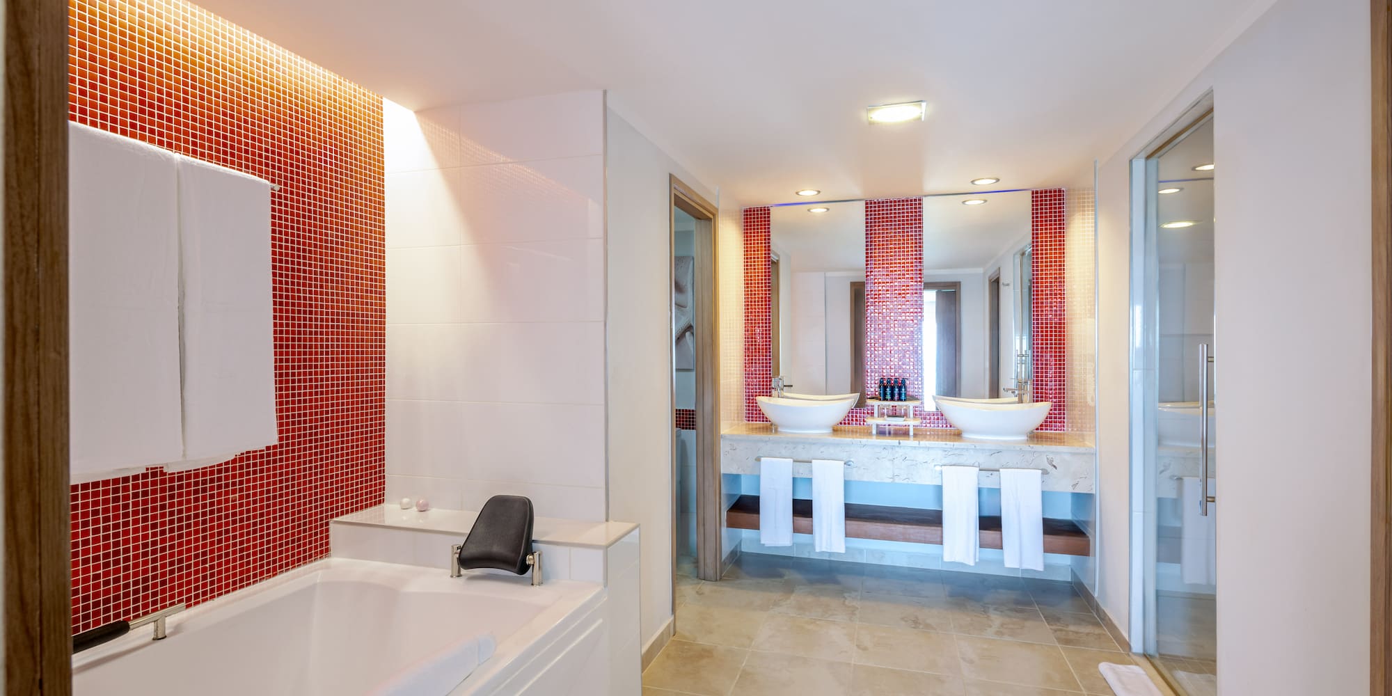 a bathroom with a bathtub and sink