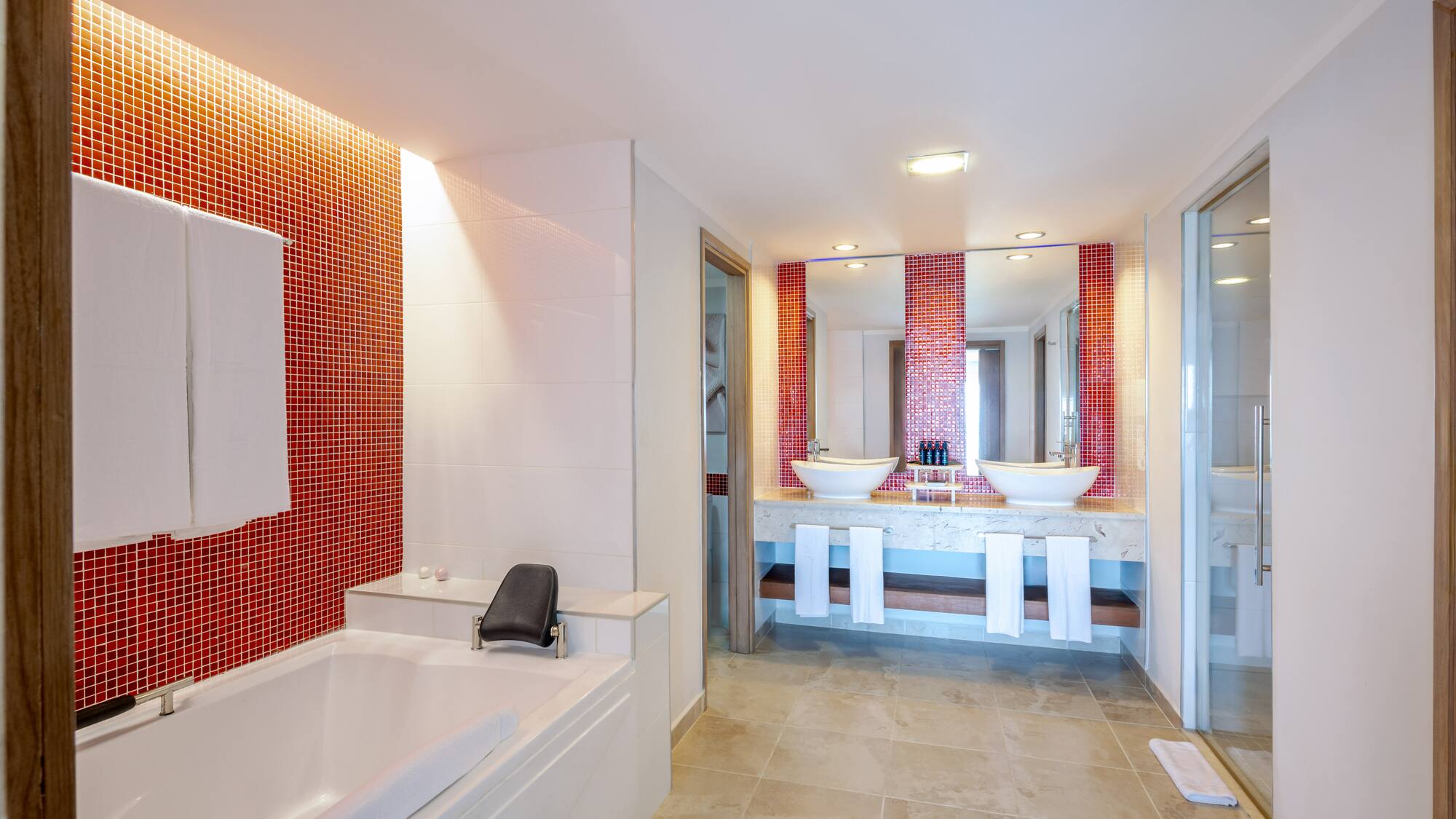 a bathroom with a bathtub and sink