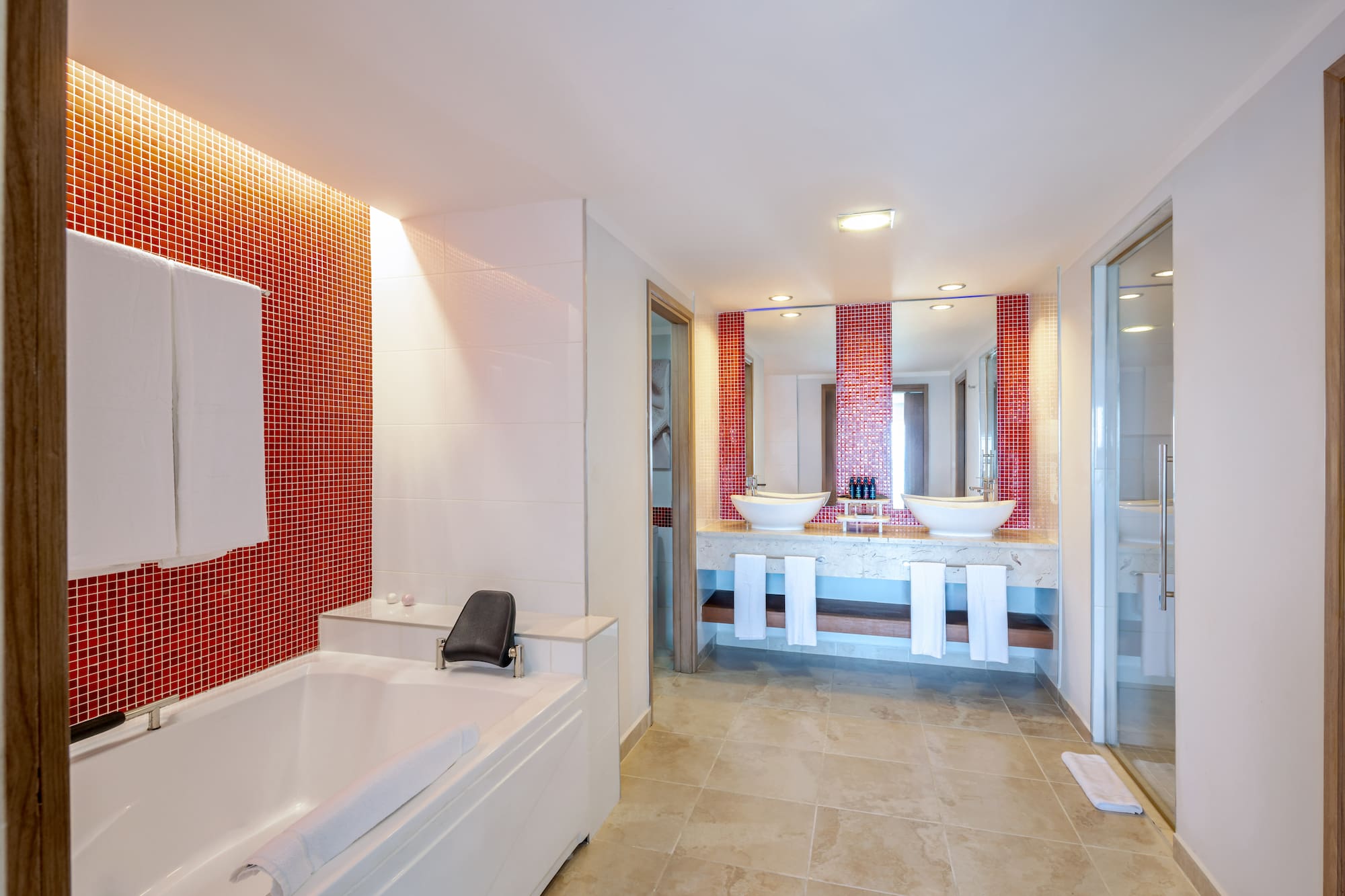 a bathroom with a bathtub and sink