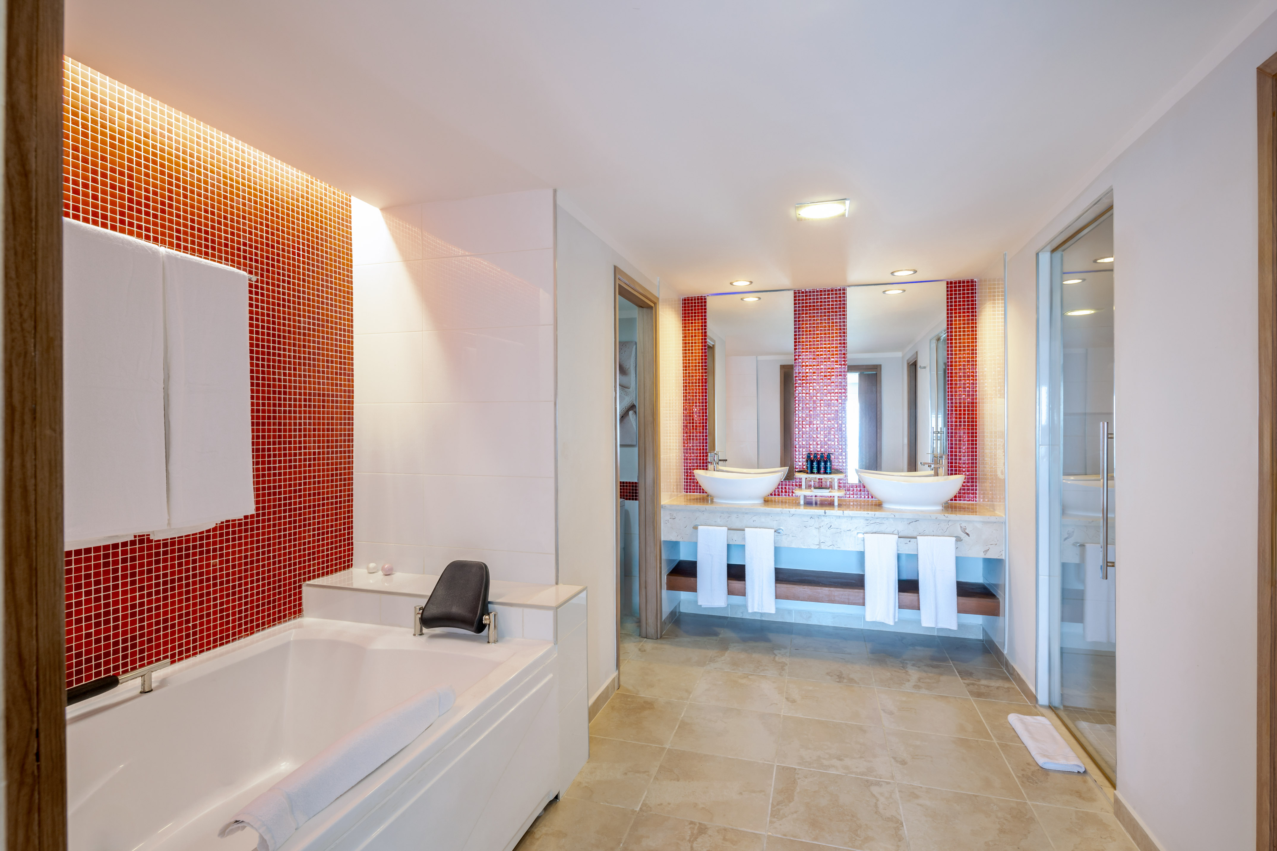 a bathroom with a bathtub and sink