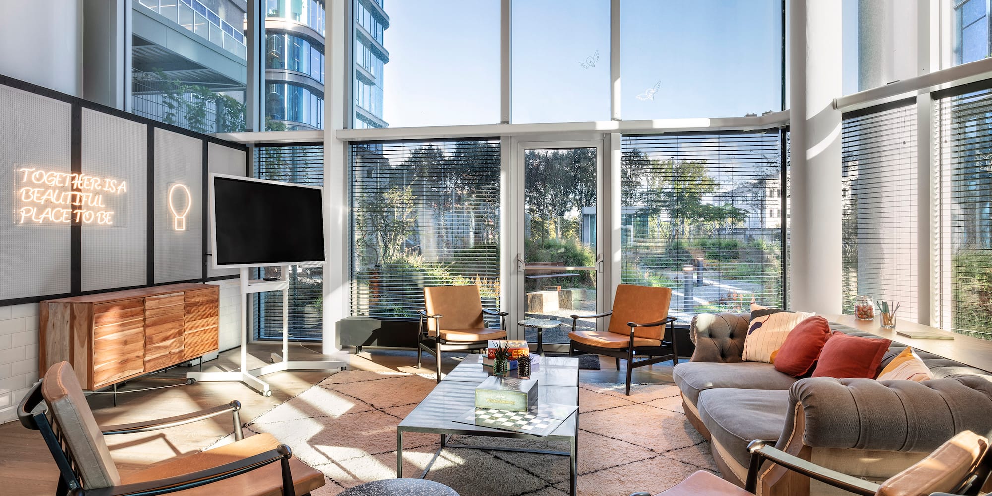 a room with a television and couches