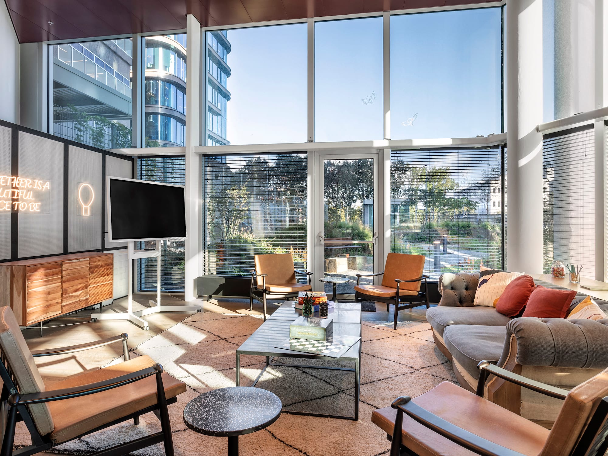 a room with a television and couches