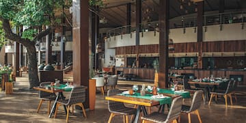 a restaurant with tables and chairs