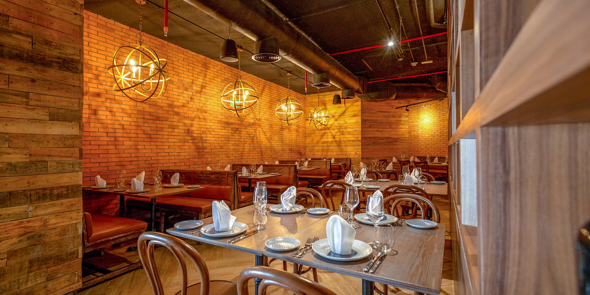 a restaurant with tables and chairs