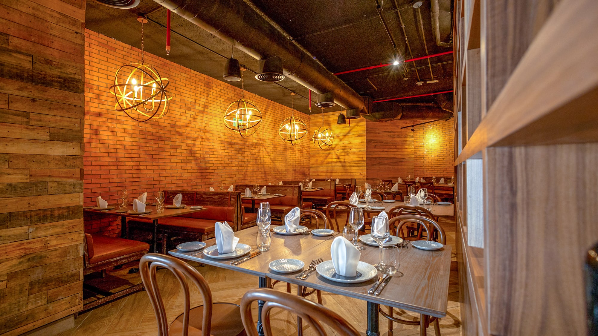 a restaurant with tables and chairs