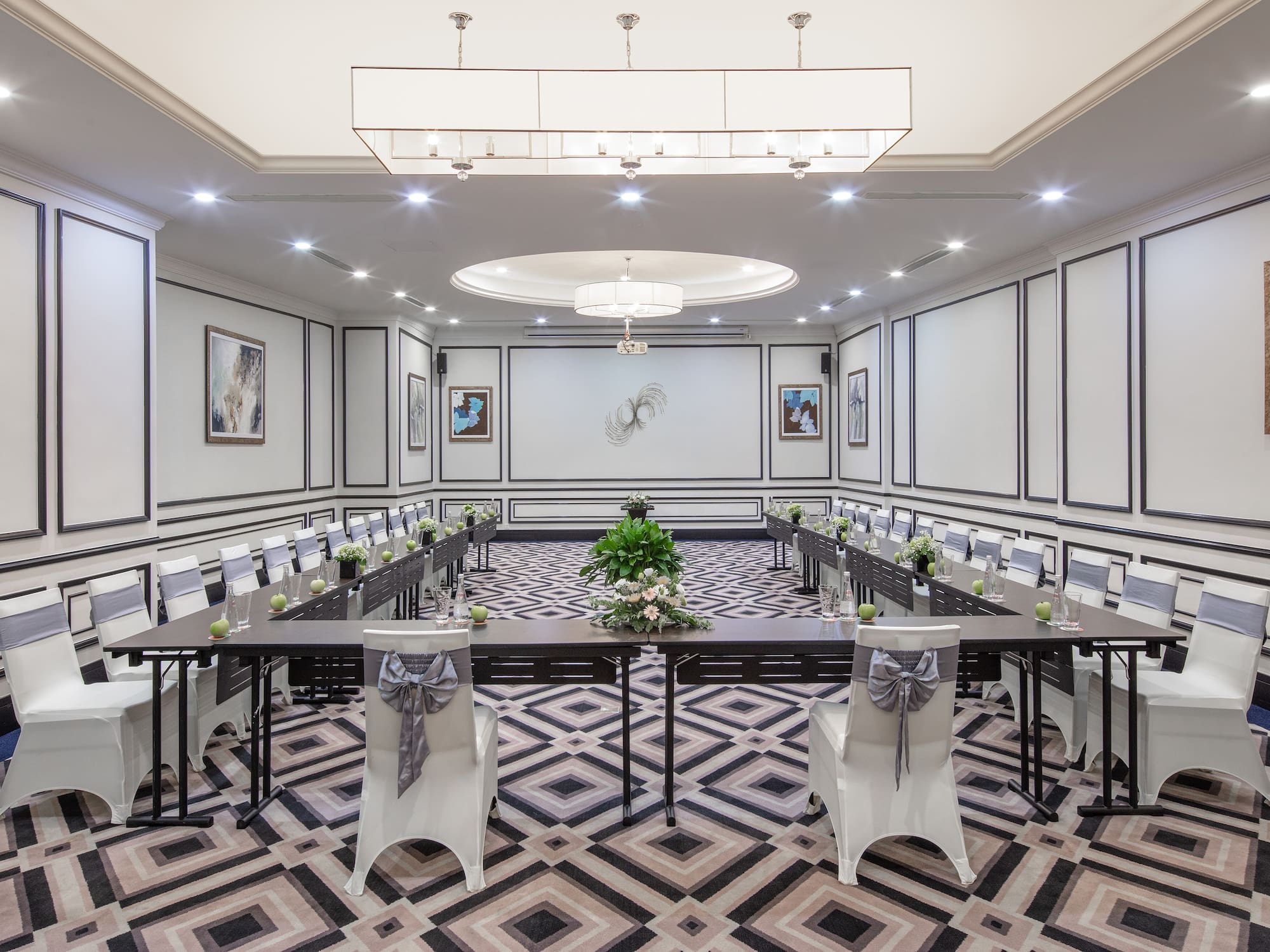 a room with tables and chairs