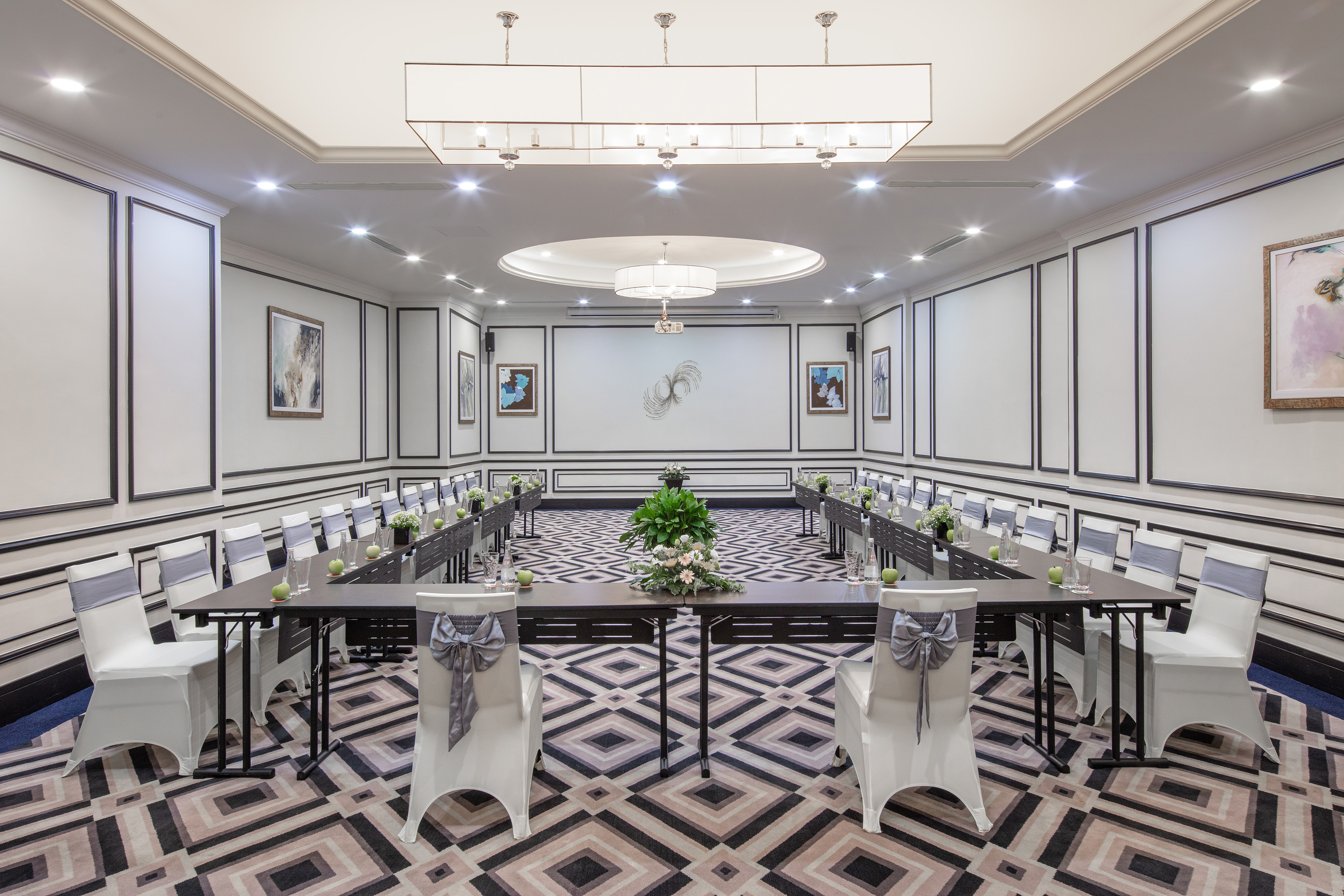 a room with tables and chairs