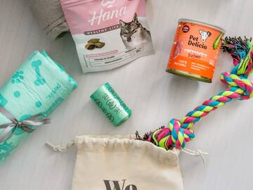 a group of dog food and toys