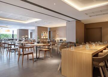 a room with a large ceiling and a large doorway