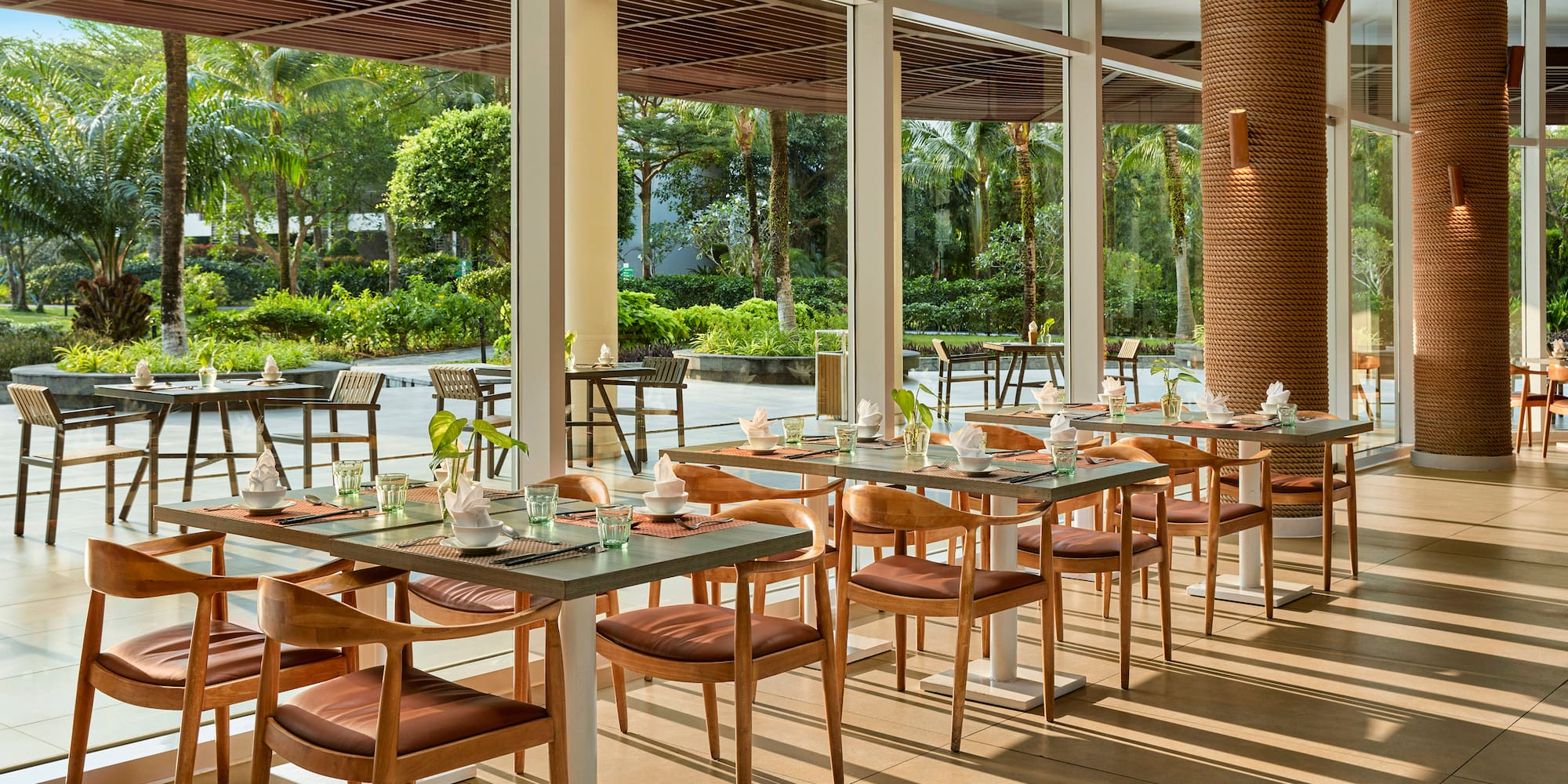 a restaurant with tables and chairs