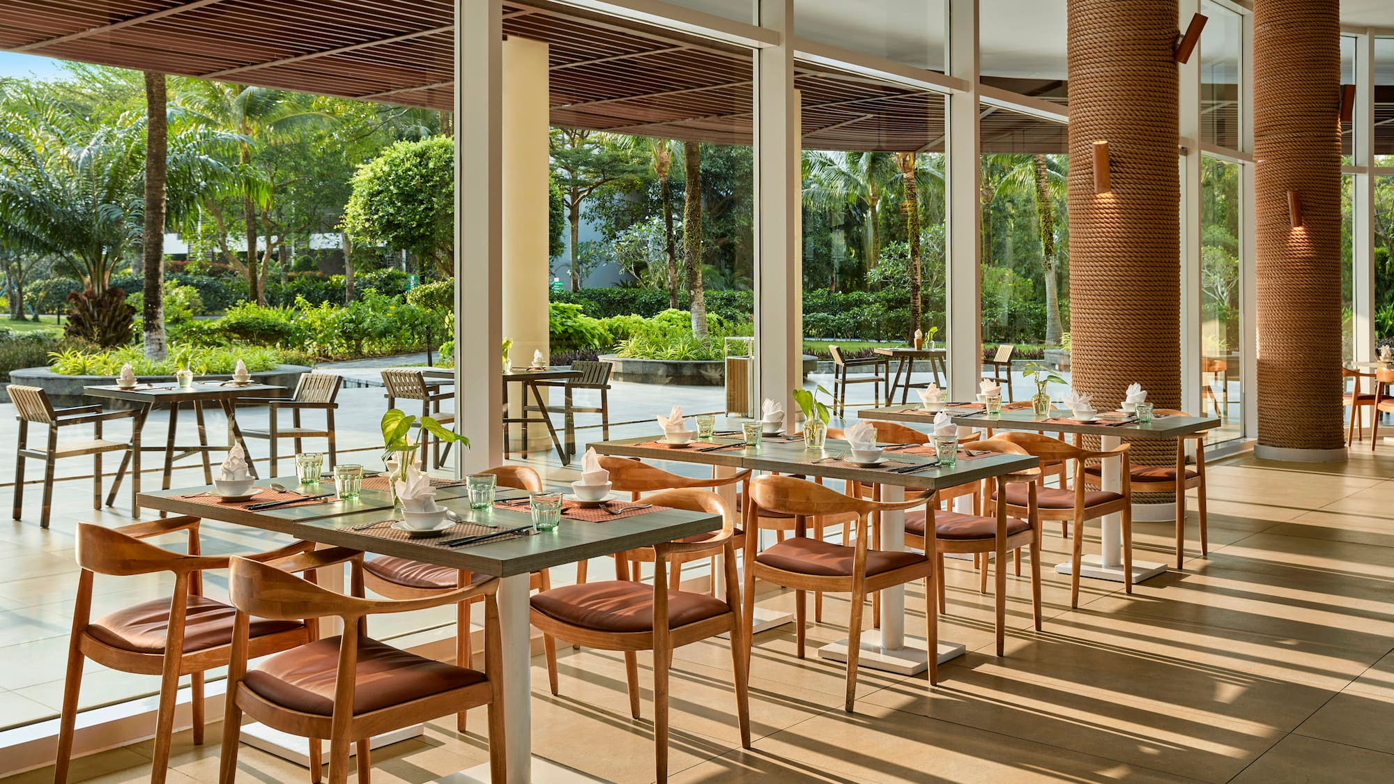 a restaurant with tables and chairs
