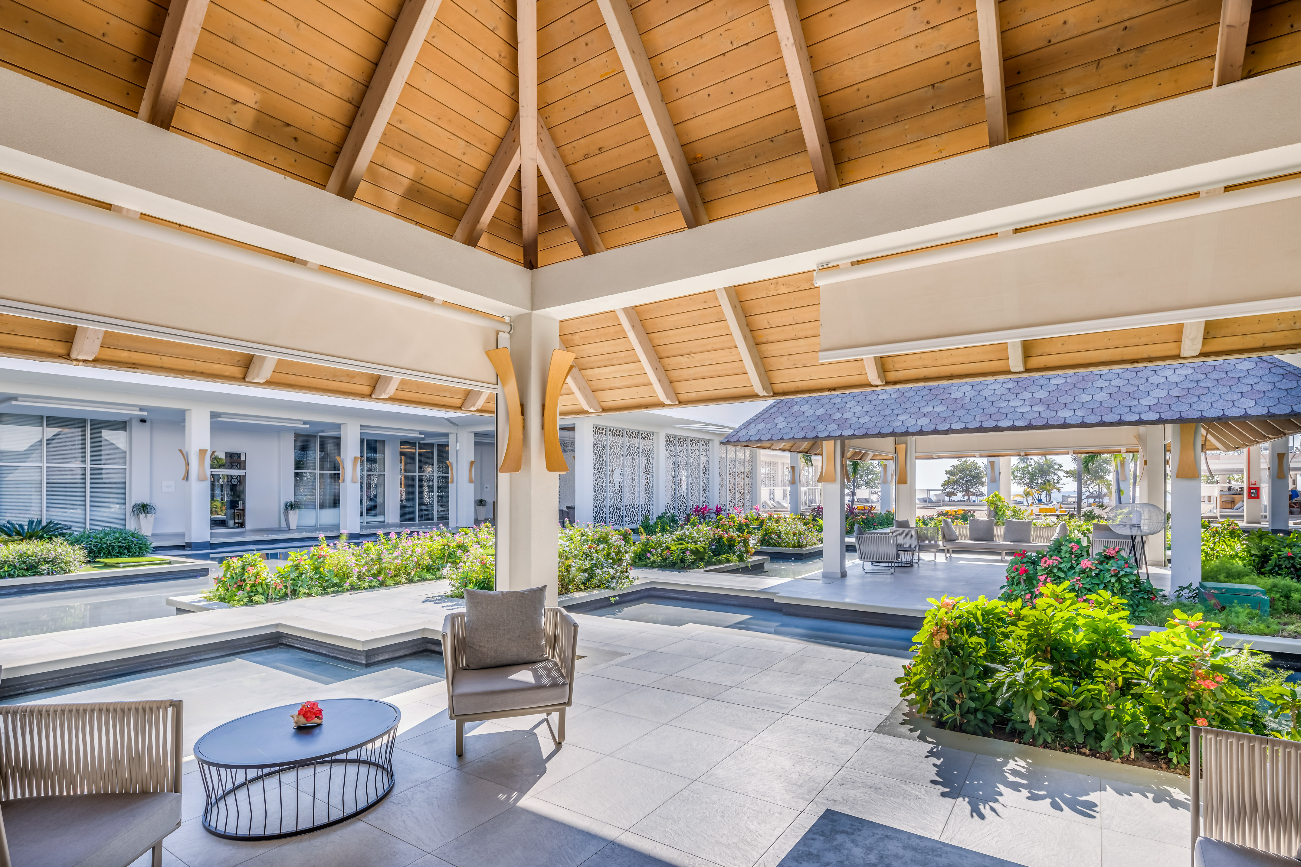a patio with a chair and a table