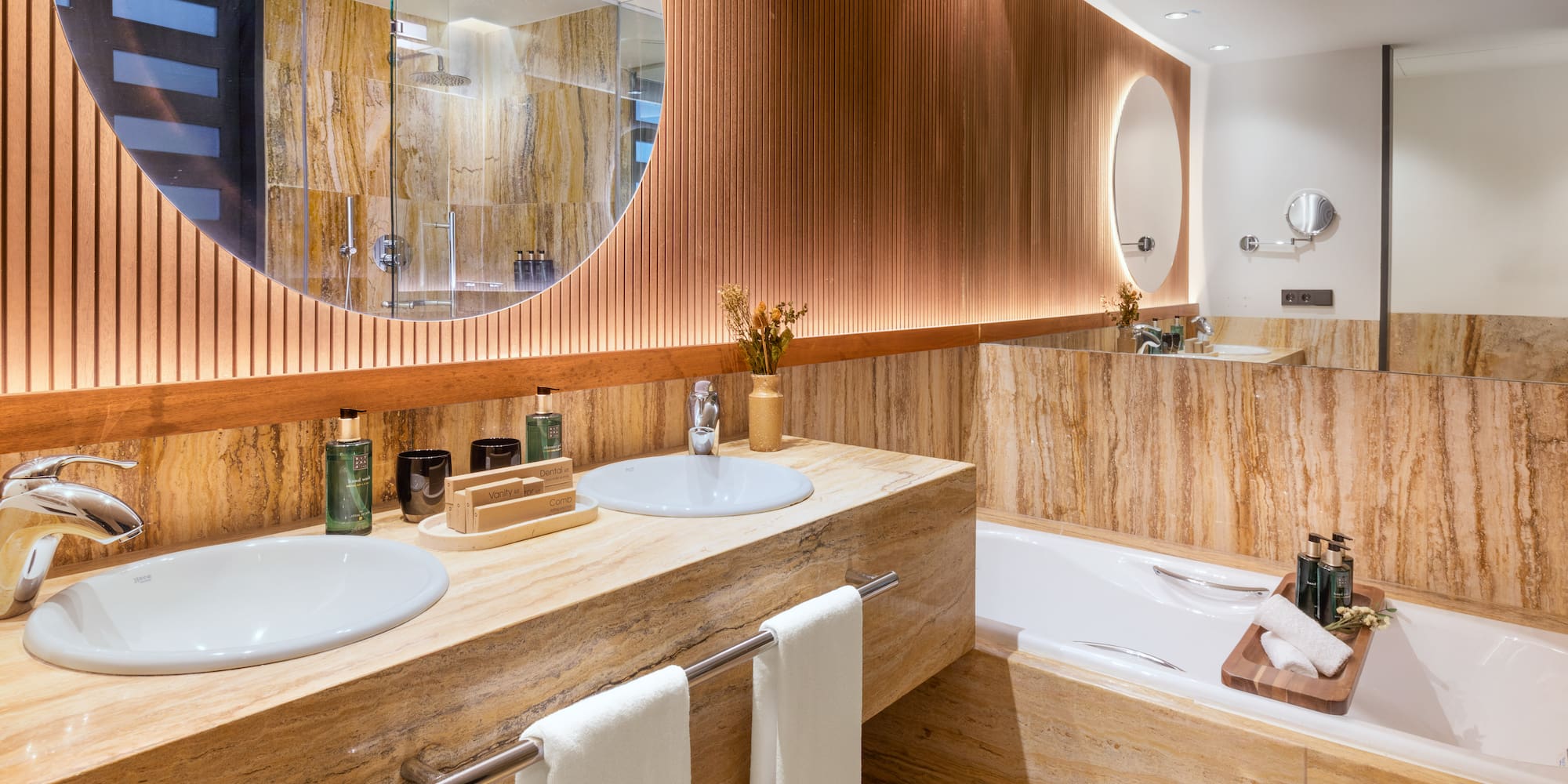 a bathroom with a tub and sink