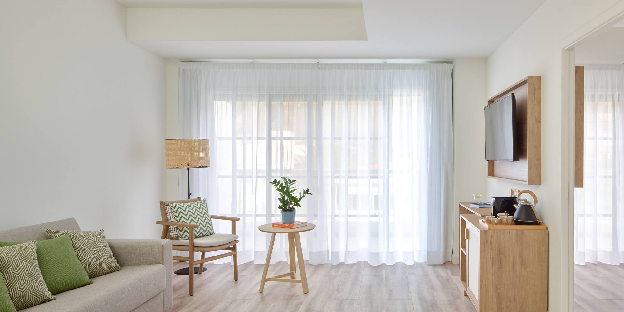 a living room with a tv and a couch