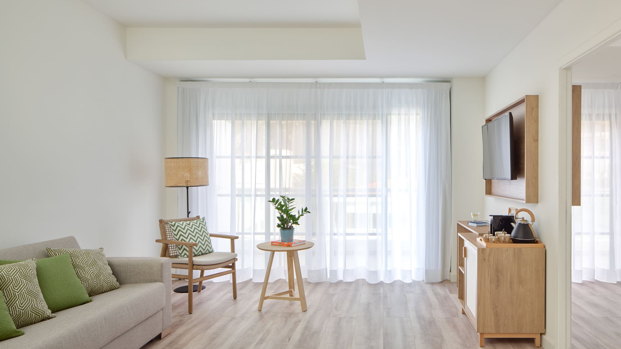 a living room with a tv and a couch