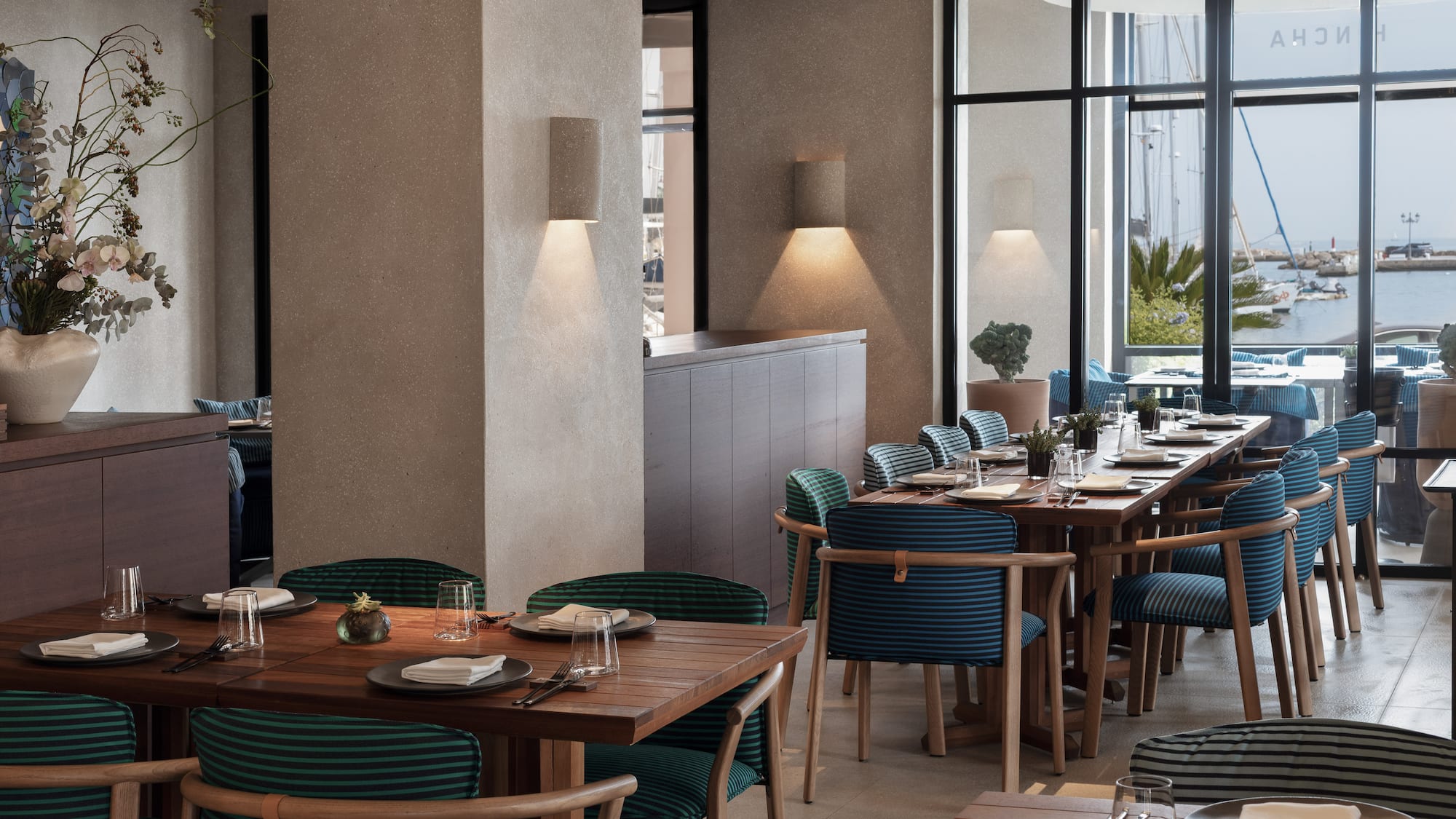 a restaurant with tables and chairs